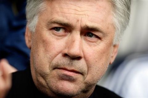 Chelsea manager Carlo Ancelotti looks on before the English Premier League soccer match against West Bromwich Albion at the Hawthorns stadium, West Bromwich, England, Saturday, April 16, 2011. (AP Photo/Simon Dawson) NO INTERNET/MOBILE USAGE WITHOUT FOOTBALL ASSOCIATION PREMIER LEAGUE (FAPL) LICENCE. CALL +44 (0) 20 7864 9121 or EMAIL info@football-datco.com FOR DETAILS