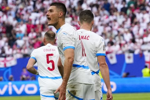 Czech Republic's Patrik Schick celebrates after scoring his side first goal during a Group F match between Georgia and the Czech Republic at the Euro 2024 soccer tournament in Hamburg, Germany, Saturday, June 22, 2024. (AP Photo/Ebrahim Noroozi)