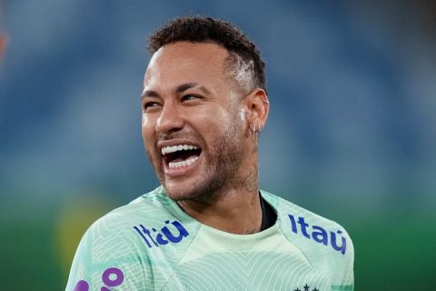 Brazil's Neymar laughs during a training session in Cuiaba, Brazil, Wednesday, Oct. 11, 2023. Brazil will face Venezuela in a World Cup 2026 qualifying soccer match on Thursday. (AP Photo/Andre Penner)