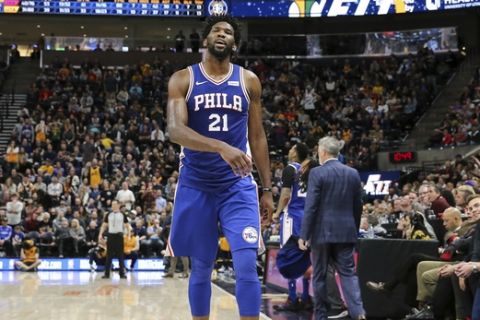 Philadelphia 76ers center Joel Embiid (21) walks off of the court after getting his sixth foul of the game against the Utah Jazz during the second half of an NBA basketball game, Thursday, Dec. 27, 2018, in Salt Lake City. The 76ers won 114-97. (AP Photo/Chris Nicoll)