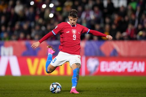 Czech Republic's Adam Hlozek attempts a shot at goal during the Euro 2024 group E qualifying soccer match between the Czech Republic and Moldova, at the Andruv Stadium in Olomouc, Czech Republic, Monday, Nov. 20, 2023. (AP Photo/Petr David Josek)