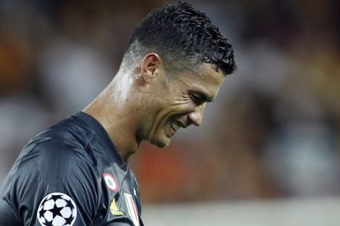 Juventus forward Cristiano Ronaldo reacts after receiving a red card during the Champions League, group H soccer match between Valencia and Juventus, at the Mestalla stadium in Valencia, Spain, Wednesday, Sept. 19, 2018. (AP Photo/Alberto Saiz)