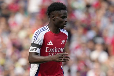 Arsenal's Bukayo Saka in action during the English Premier League soccer match between Arsenal and Wolverhampton Wanderers at Emirates Stadium in London, England, Saturday, Aug. 17, 2024. (AP Photo/Frank Augstein)