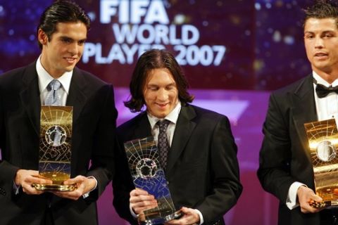 Soccer players Kaka, left, from Brazil, first placed, Argentinas Lionel Messi, center, second placed and Cristiano Ronaldo, right, from Portugal, third placed, pose with their trophies, during the 17th Fifa World Player Gala in Zurich, Switzerland, Monday, Dec. 17, 2007. (AP Photo/KEYSTONE/Walter Bieri)