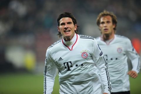 Mario Gomez (R) of Bayern Munchen celebrates after he scored 1-0 against CFR Cluj 1907 during  the Champions League football match in Cluj-Napoca city (480km northwest from Bucharest) on November 3, 2010 . AFP PHOTO DANIEL MIHAILESCU (Photo credit should read DANIEL MIHAILESCU/AFP/Getty Images)