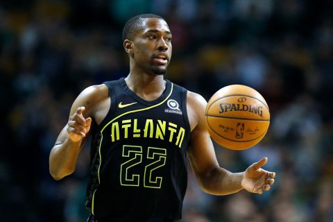 Atlanta Hawks' Isaiah Taylor plays against the Boston Celtics during the first quarter of an NBA basketball game in Boston, Sunday, April 8, 2018. (AP Photo/Michael Dwyer)