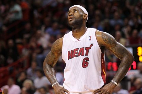 MIAMI, FL - JANUARY 31:  LeBron James #6 of the Miami Heat looks on during a game against the Cleveland Cavaliers at American Airlines Arena on January 31, 2011 in Miami, Florida. NOTE TO USER: User expressly acknowledges and agrees that, by downloading and/or using this Photograph, User is consenting to the terms and conditions of the Getty Images License Agreement.  (Photo by Mike Ehrmann/Getty Images)