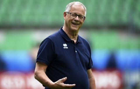 Iceland's Swedish coach Lars Lagerbaeck smiles during a training session at the Geoffroy-Guichard Stadium in Saint-Etienne, central-eastern France, on June 13, 2016, on the eve of their Euro 2016 football tournament match against Portugal. / AFP PHOTO / FRANCISCO LEONG