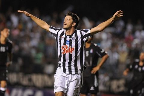 Nicolas Pavlovich of Paraguay's Libertad celebrates his goal against Colombian Once Caldas during their Copa Libertadores football match in Libertad stadium in Asuncion, Paraguay, on March 22, 2011. AFP PHOTO / Norberto Duarte (Photo credit should read NORBERTO DUARTE/AFP/Getty Images)