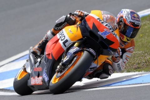 Repsol Honda's Australian Casey Stoner rides on May 5, 2012 during the Moto GP qualifying practice for the Portuguese Grand Prix in Estoril, on the outskirts of Lisbon. AFP PHOTO / MIGUEL RIOPA        (Photo credit should read MIGUEL RIOPA/AFP/GettyImages)