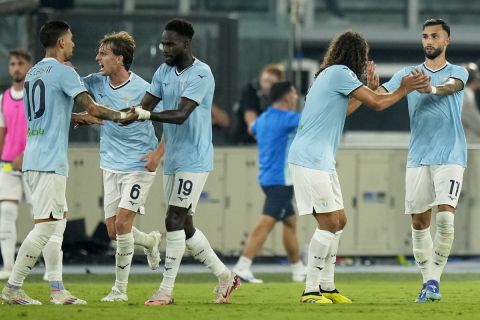 Lazio's Taty Castellanos, right, celebrates after scoring his side's first goal during a Serie A soccer match between Lazio and AC Milan, at Rome's Stadio Olimpico, Saturday, Aug. 31, 2024. (AP Photo/Andrew Medichini)