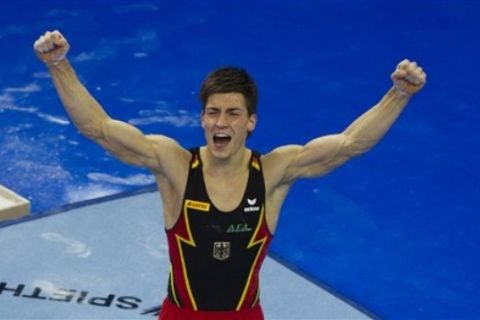 Germany's Philipp Boy celebrates after he performs at the floor during the men's individual all-around final at the Artistic Gymnastics European Championships  in Berlin on Friday, April 8, 2011. Boy won the competition.(AP Photo/Markus Schreiber)