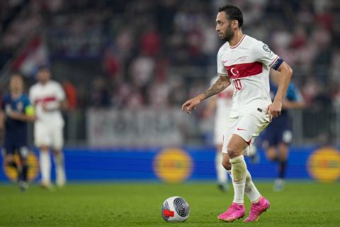 Turkey's Hakan Calhanoglu controls the ball during the Euro 2024 group D qualifying soccer match between Croatia and Turkey at the Opus Arena in Osijek, Croatia, Thursday, Oct. 12, 2023. (AP Photo/Darko Bandic)