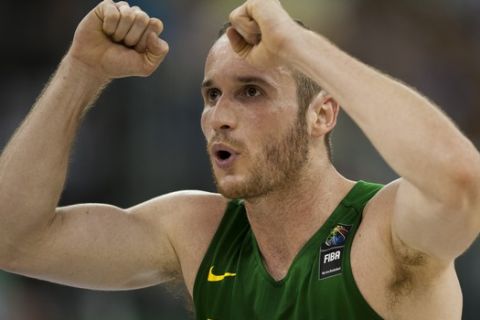 Brazil's Marcelinho Huertas gestures during the Group A Basketball World Cup match between Brazil and France in Granada, Spain, Saturday, Aug. 30, 2014. The 2014 Basketball World Cup competition will take place in various cities in Spain from Aug. 30 through to Sept. 14. (AP Photo/Daniel Tejedor)