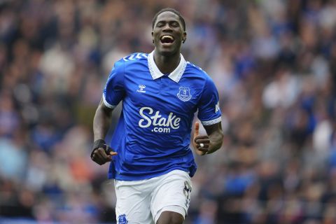 Everton's Amadou Onana warms up before the English Premier League soccer match between Everton and Arsenal at the Goodison Park stadium in Liverpool, England, Sunday, Sept. 17, 2023. (AP Photo/Jon Super)