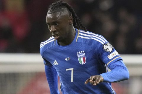 Italy's Moise Kean is in action during the Euro 2024 group C qualifying soccer match between England and Italy at Wembley stadium in London, Tuesday, Oct. 17, 2023. (AP Photo/Frank Augstein)