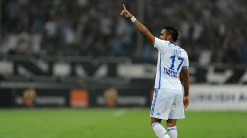 MARSEILLE, FRANCE - AUGUST 29:  Dimitri Payet of Marseille celebrates scoring his team's first goal during the French Ligue 1 match between Olympique de Marseille and OGC Nice at Stade Velodrome on August 29, 2014 in Marseille, France.  (Photo by Kaz Photography/Getty Images)