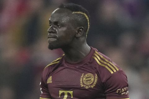 Bayern's Sadio Mane, right, celebrates after scoring during the German Bundesliga soccer match between FC Bayern Munich and Bayer 04 Leverkusen at the Allianz Arena in Munich, Germany, Sept. 30, 2022. (AP Photo/Matthias Schrader)