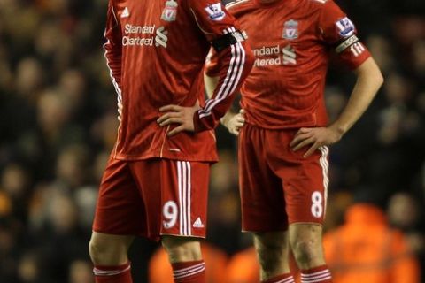 LIVERPOOL, ENGLAND - DECEMBER 29:  Fernando Torres and Steven Gerrard (R) of Liverpool look dejected after Wolverhampton Wanderers opened the scoring during the Barclays Premier League match between Liverpool and Wolverhampton Wanderers at Anfield on December 29, 2010 in Liverpool, England.  (Photo by Clive Brunskill/Getty Images)