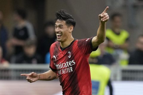 AC Milan's Tijjani Reijnders celebrates after scoring his side's third goal during the Serie A soccer match between AC Milan and Cagliari at the San Siro stadium, in Milan, Italy, Saturday, May 11, 2024. (AP Photo/Antonio Calanni)