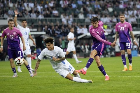 Germany's Kai Havertz shoots on goal during the international friendly soccer match between Germany and Greece at the Borussia Park in Moenchengladbach, Germany, Friday, June 7, 20204. (AP Photo/Martin Meissner)