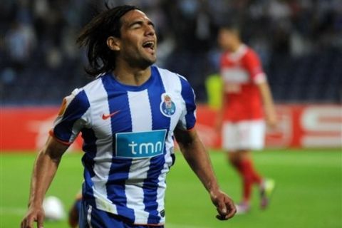 FC Porto's Radamel Falcao, from Colombia, celebrates after scoring against Spartak Moscow during their Europa League quarter-final, first leg soccer match at the Dragao Stadium, Porto, Portugal, Thursday April 7, 2011. (AP Photo/Paulo Duarte)