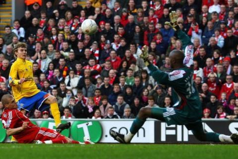 LIVERPOOL, UNITED KINGDOM - JANUARY 26:  Alfie Potter of Havant scores Havant's 2nd goal past Charles-Hubert Itandje of Liverpool during the FA Cup 4th round sponsored by E.ON match between Liverpool and Havant & Waterlooville at Anfield on January 26, 2008 in Liverpool, England.  (Photo by Mark Thompson/Getty Images)