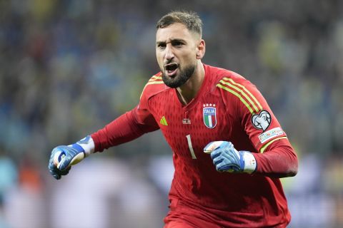 Italy's goalkeeper Gianluigi Donnarumma reacts after the Euro 2024 group C qualifying soccer match between Ukraine and Italy at the BayArena in Leverkusen, Germany, Monday, Nov. 20, 2023. (AP Photo/Martin Meissner)