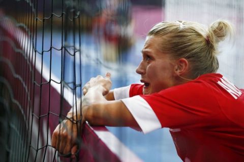 Denmark's Ann Grete Norgaard cries after their loss to Norway in their women's handball Preliminaries Group B match at the Copper Box venue during the London 2012 Olympic Games August 3, 2012.   REUTERS/Marko Djurica (BRITAIN  - Tags: SPORT HANDBALL OLYMPICS)  