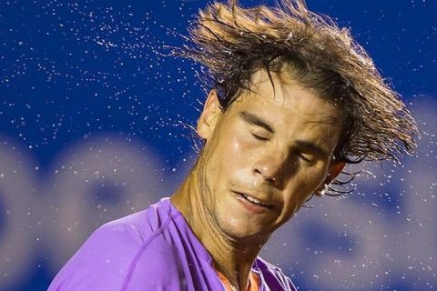 ACAPULCO, MEXICO FEBRUARY 26: Rafael Nadal of Spain shakes his head during a tennis match against Diego Schartzman of Argentina as part of the Mexican Tennis Open Acapulco 2013 at Pacific resort on February 26, 2013 in Acapulco, Mexico. (Photo by Miguel Tovar/LatinContent/Getty Images)