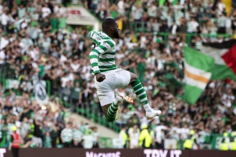 Celtic's Olivier Ntcham celebrates scoring his side's second goal of the game during the Champions League second qualifying round, first leg soccer match between Celtic and Rosenborg, at Celtic Park, Glasgow, Scotland, Wednesday, July 25, 2016. (Jeff Holmes/PA via AP)