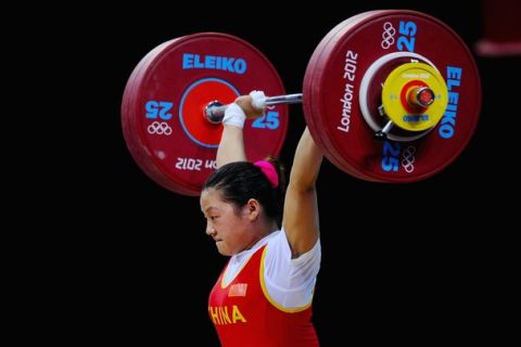 LONDON, ENGLAND - JULY 30:  Xueying Li of China competes in the Women's 58kg Weightlifting on Day 3 of the London 2012 Olympic Games at ExCeL on July 30, 2012 in London, England.  (Photo by Laurence Griffiths/Getty Images)