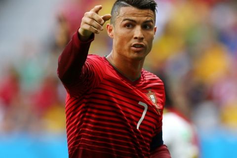 BRASILIA, BRAZIL - JUNE 26:  Cristiano Ronaldo of Portugal reacts during the 2014 FIFA World Cup Brazil Group G match between Portugal and Ghana at Estadio Nacional on June 26, 2014 in Brasilia, Brazil.  (Photo by Elsa/Getty Images)