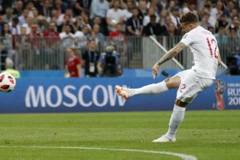 England's Kieran Trippier scores the opening goal during the semifinal match between Croatia and England at the 2018 soccer World Cup in the Luzhniki Stadium in Moscow, Russia, Wednesday, July 11, 2018. (AP Photo/Frank Augstein)