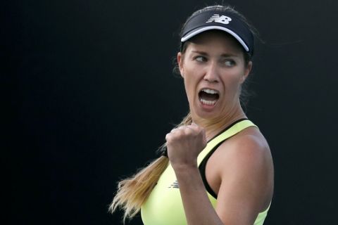 Danielle Collins of the U.S. reacts during her first round match against Russia's Vitalia Diatchenko at the Australian Open tennis championship in Melbourne, Australia, Tuesday, Jan. 21, 2020. (AP Photo/Andy Wong)