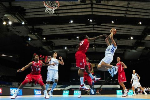 Sylvia Fowles (L) of US tries to stop Evanthia Maltsi, captain of Greece, during the match between USA and Greece during the Women's FIBA World Championship 2010 in Ostrava on September 23, 2010. AFP PHOTO/JOE KLAMAR (Photo credit should read JOE KLAMAR/AFP/Getty Images)