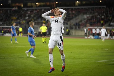 Germany's Maximilian Beier reacts after missing a scoring chance during an international friendly soccer match between Germany and Ukraine at the Max Morlock stadium in Nuremberg, Germany, Monday, June 3, 2024. (AP Photo/Matthias Schrader)