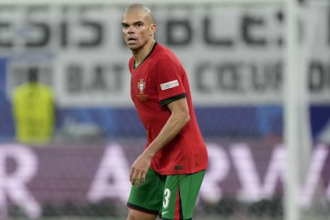 Portugal's Pepe controls the ball during a quarter final match between Portugal and France at the Euro 2024 soccer tournament in Hamburg, Germany, Friday, July 5, 2024. (AP Photo/Martin Meissner)