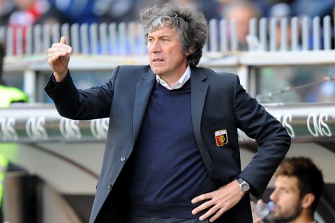 Genoa coach Alberto Malesani gestures during a Serie A soccer match between Genoa and Siena, at Genoa's Luigi Ferraris stadium, Italy, Sunday, April 22, 2012. (AP Photo/Tanopress)