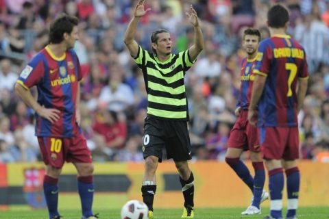 Hercules' Paraguayan forward Nelson Valdez (C) celebrates his goal during his team's Spanish League football match against Barcelona at the Camp Nou stadium in Barcelona on September 11, 2010. AFP PHOTO / JOSEP LAGO (Photo credit should read JOSEP LAGO/AFP/Getty Images)