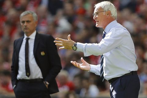 Leicester's Team Manager Claudio Ranieri, right, and Manchester United's Tema Manager Jose Mourinho react during the Community Shield soccer match between Leicester and Manchester United at Wembley stadium in London, Sunday, Aug. 7, 2016 . (AP Photo/Frank Augstein)