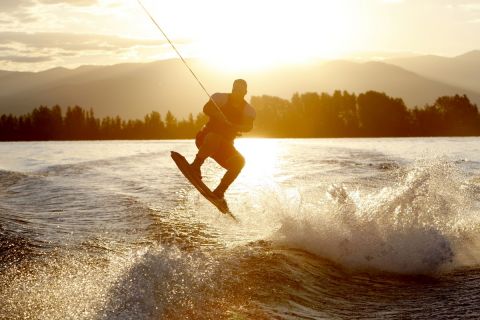 "A wakeboarder catches air during a sunrise session on Lake Pend Oreille, near Sandpoint, Idaho"