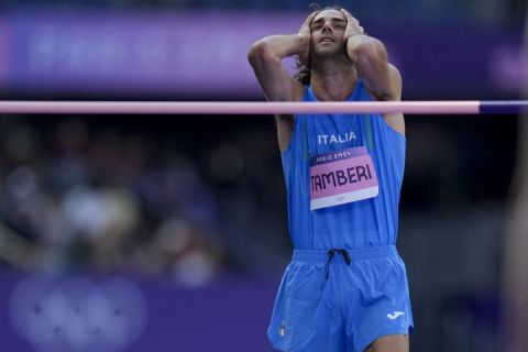 Gianmarco Tamberi, of Italy, reacts during the men's high jump qualification at the 2024 Summer Olympics, Wednesday, Aug. 7, 2024, in Saint-Denis, France. (AP Photo/Natacha Pisarenko)