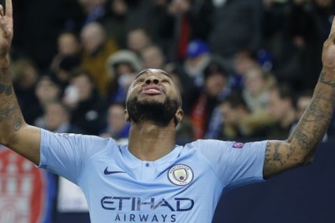 Manchester City forward Raheem Sterling celebrates scoring his side's third goal putting the final score at a 3-2 win for his team during the first leg, round of sixteen, Champions League soccer match between Schalke 04 and Manchester City at Veltins Arena in Gelsenkirchen, Germany, Wednesday Feb. 20, 2019. (AP Photo/Michael Probst)