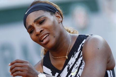 Serena Williams of the U.S. reacts after missing a shot and loosing her third round match of the French Open tennis tournament against Sofia Kenin of the U.S. in two sets, 2-6, 5-7, at the Roland Garros stadium in Paris, Saturday, June 1, 2019. (AP Photo/Christophe Ena )