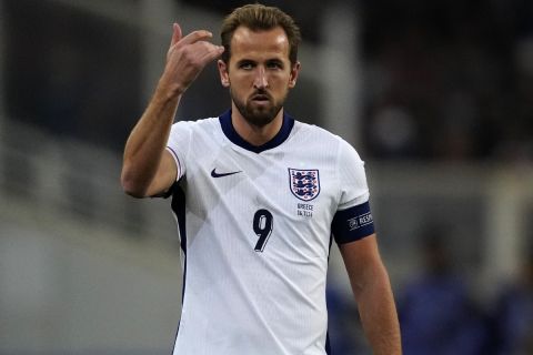 England's Harry Kane gestures during the UEFA Nations League Group F soccer match between Greece and England at Olympic Stadium in Athens, Thursday, Nov. 14, 2024. (AP Photo/Thanassis Stavrakis)