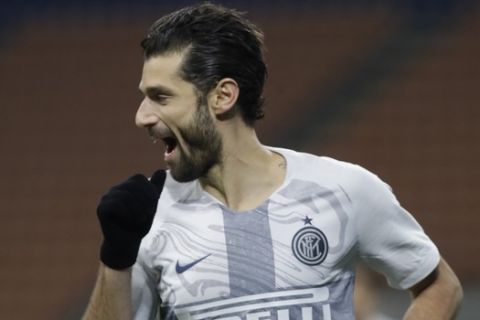 Inter Milan's Antonio Candreva celebrates after scoring his team's second goal during an Italian Cup second round soccer match between Inter Milan and Benevento, at the San Siro stadium in Milan, Italy, Sunday, Jan. 13, 2019. (AP Photo/Luca Bruno)