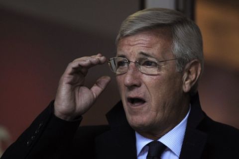 The former head coach of the Italian National football Team, Marcello Lippi, takes place before the Italian Serie A football match AC Milan vs Palermo, on November 10, 2010 in San Siro stadium in Milan. AFP PHOTO / OLIVIER MORIN (Photo credit should read OLIVIER MORIN/AFP/Getty Images)