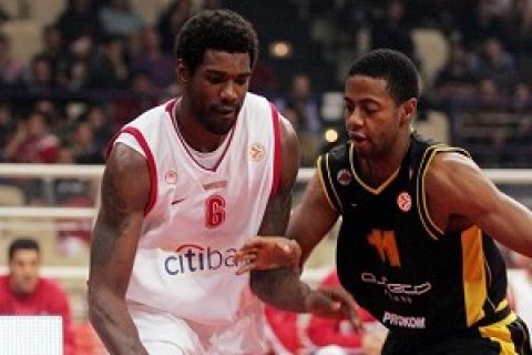 #11 Olympiacos Lynn Greer and #11 Prokom Trefl Sopot Mustafa Shakur