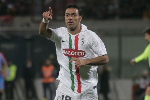 Juventus forward Fabio Quagliarella jubilates after scoring against Catania on December 5, 2010 during their Serie A football match at Massimino Stadium in Catania. AFP PHOTO / MARCELLO PATERNOSTRO (Photo credit should read MARCELLO PATERNOSTRO/AFP/Getty Images)